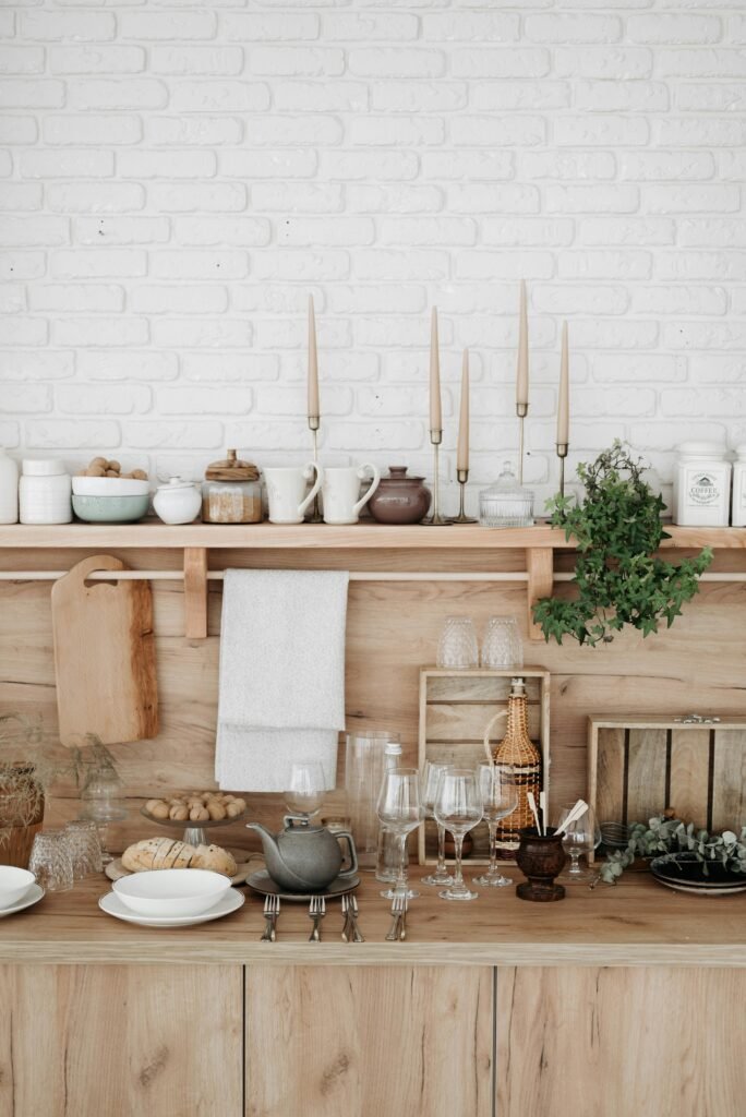 Stylish rustic kitchen with wooden accents and elegant kitchenware setup.